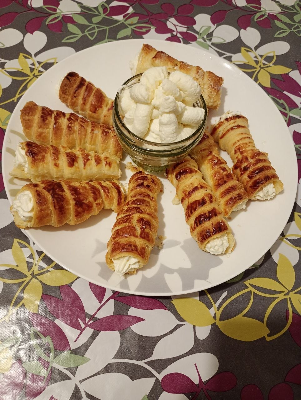 Mama Tetiana's cream horn pastries cooling on a tray