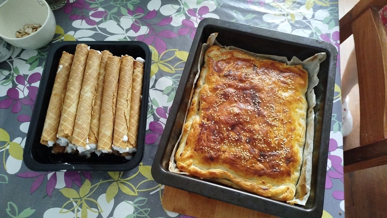 Home-baked pie and wafer cake on the kitchen table