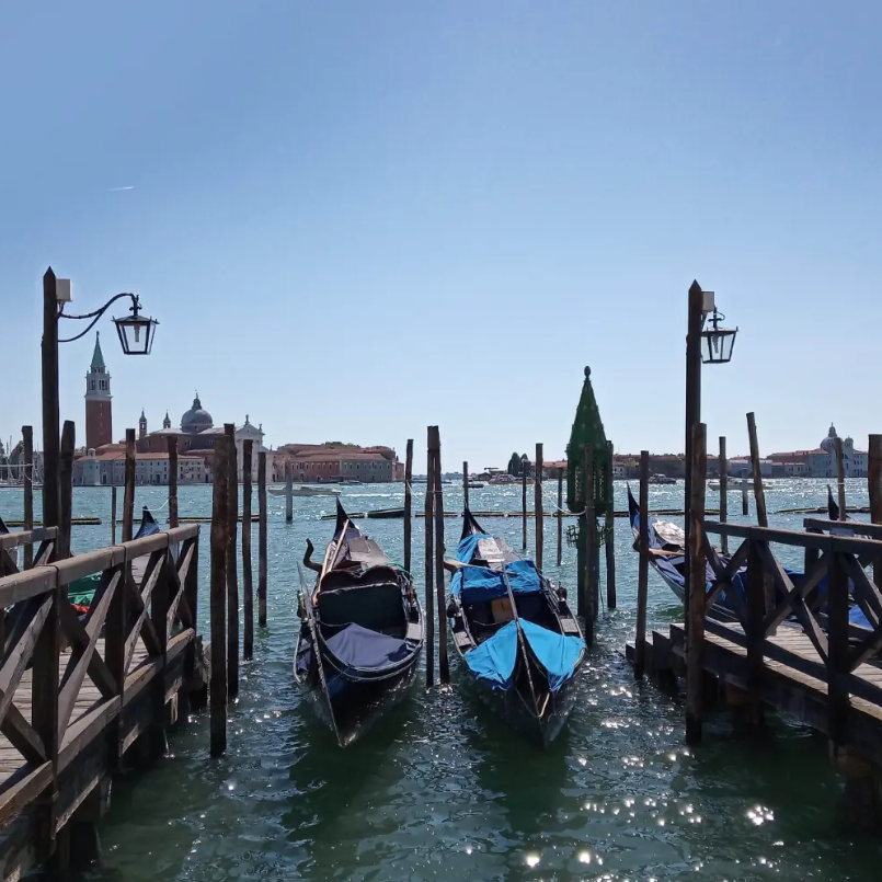 Gondolas moored on the water in Venice, Italy